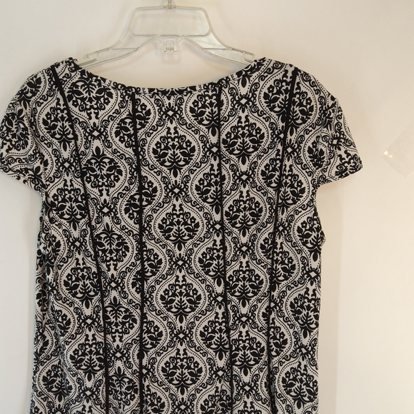 MARIA GABRIELLE SLEEVELESS BOTTOM FLARED TOP BLACK WHITE - Picture 5 of 9